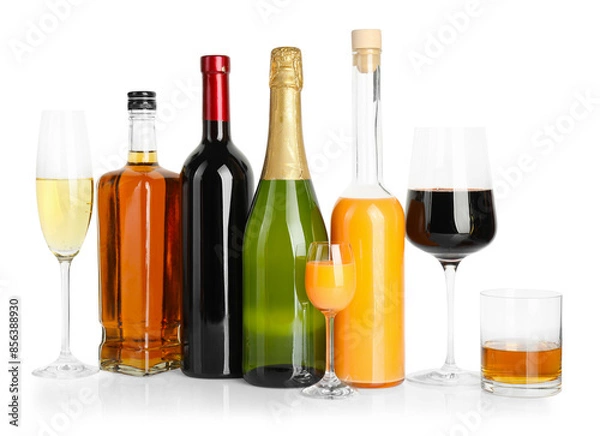 Fototapeta Bottles and glasses with different alcoholic drinks isolated on white