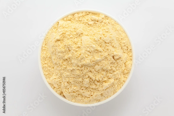 Obraz Organic Corn Flour (Zea mays) or Makka Flour, in a white ceramic bowl. Isolated on a gray background. Top View