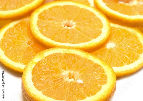 Fototapeta Orange segments isolated on white