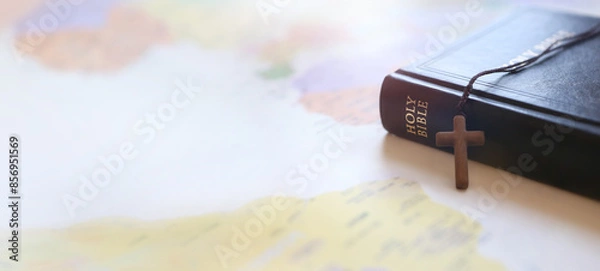 Obraz Holy cross of Jesus Christ, Bible book, world map background and mission, gospel and evangelism concept
