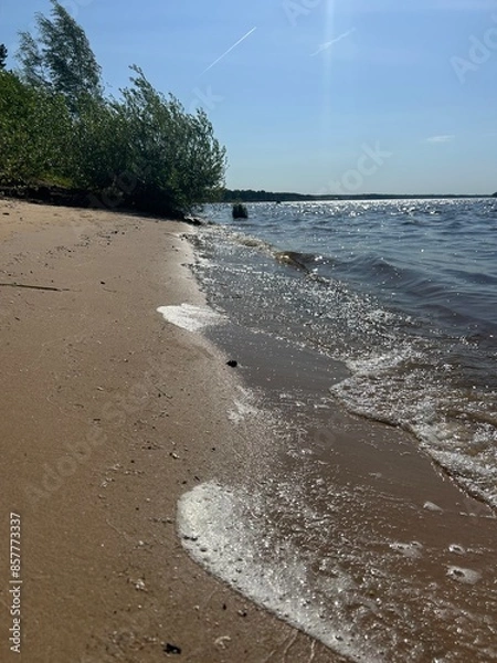 Fototapeta footprints on the beach
