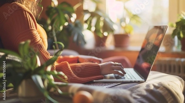 Fototapeta Balancing Work and Home Life: A remote worker manages their work-from-home schedule, balancing professional tasks with household responsibilities, making sure to maintain a healthy work-life balance