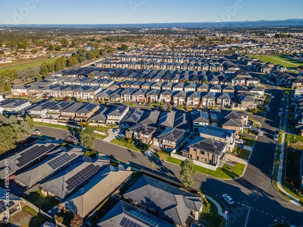 Obraz Aerial drone view of The Ponds in the North West of Sydney, NSW Australia on a sunny morning in June 2024 showing the densely packed homes and housing density 