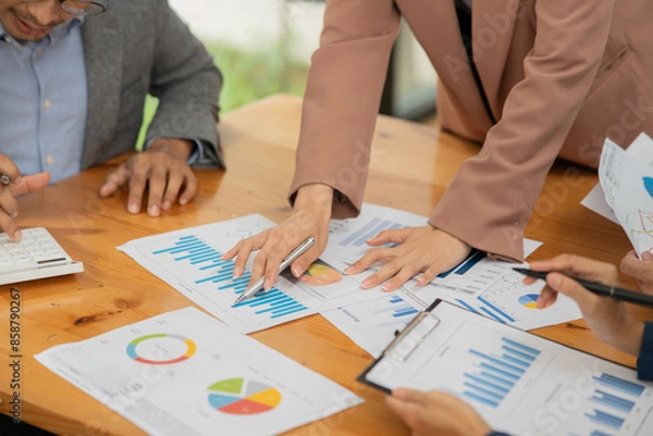 Fototapeta Asian businessmen, women and men Talk about new projects, presents at home office.