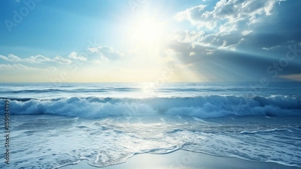 Fototapeta Ocean with gentle waves and sunbeams