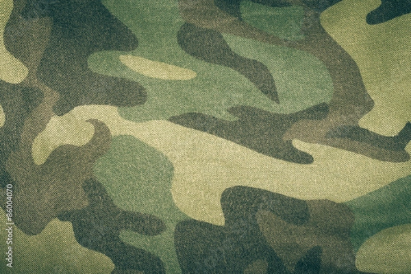 Obraz Fabrics with camouflage pattern. Background. Toned