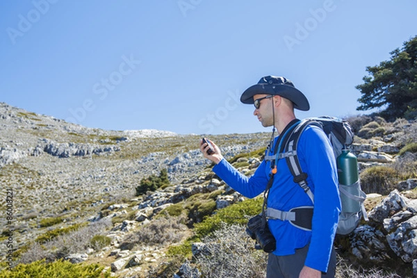 Obraz Man using gps