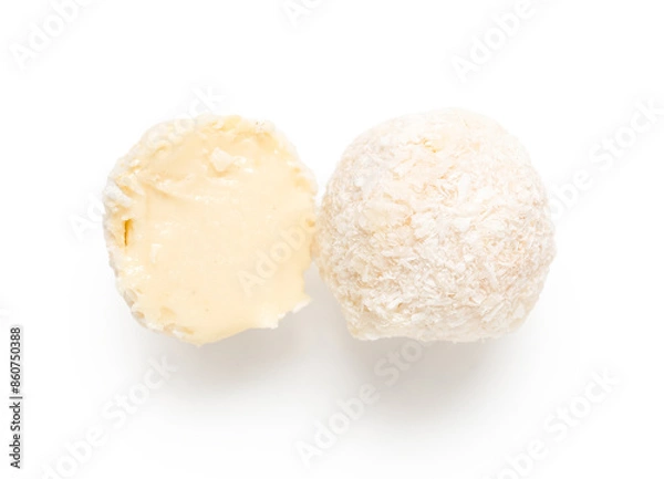 Fototapeta Delicious chocolate candies with coconut topping isolated on white background