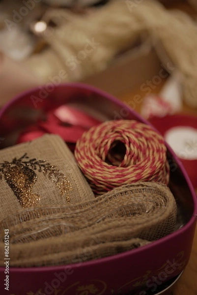 Fototapeta christmas and new year holidays. magical atmosphere. packaging and ribbons for gifts in box
