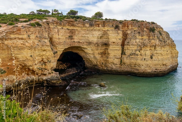 Obraz Caves in the sandstone along the Algarve coast, Portugal