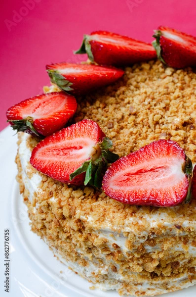 Fototapeta Crepe cake Medovik with sour cream vanilla cream and strawberries. Pancake cake Medovik decorated with strawberries.