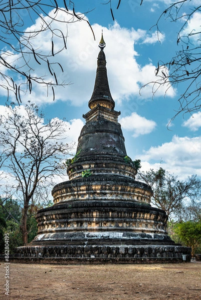 Fototapeta Wat Umong Suan Puthatham Buddhist temple in the historic centre of Chiang Mai. Ancient Buddhist temple pagoda popular tourist attraction in Chiang Mai,Thailand