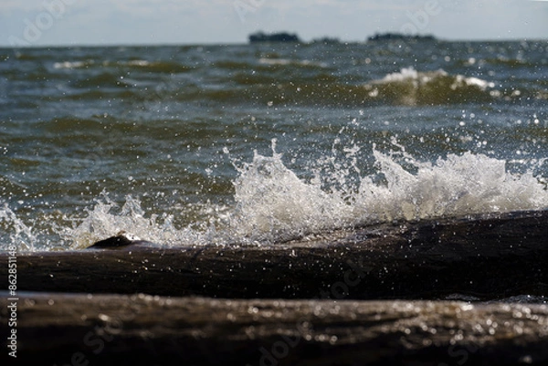 Fototapeta the sea is in the middle lane, the water breaks on the shore, the sound of the surf, room decoration, design