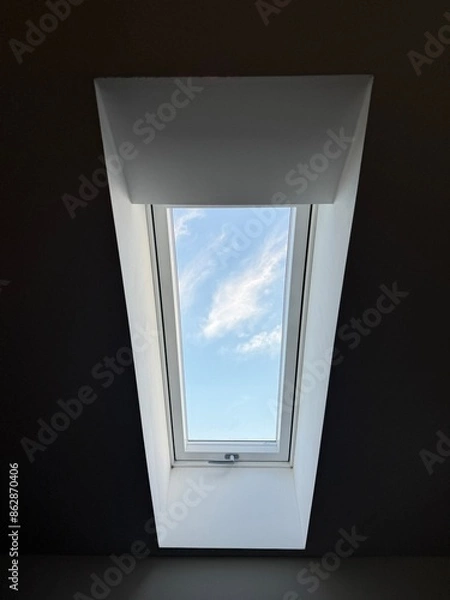 Fototapeta window blue sky with clouds