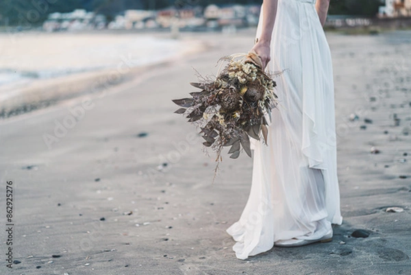 Fototapeta ブーケを持つ女性の手元