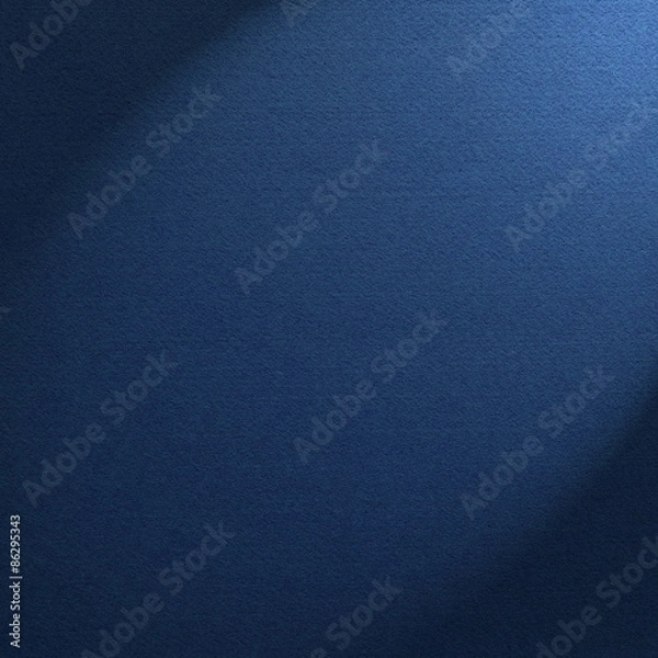 Obraz Blue felt background illuminated by a spotlight 