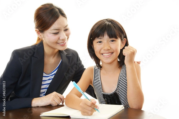 Obraz 笑顔の教師と女の子