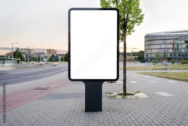 Fototapeta Blank Outdoor Poster Billboard Mockup On The Empty City Street. Vertical Advertising Lightbox In Front Of Urban Background