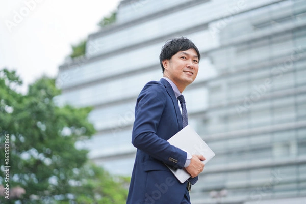 Fototapeta 街中のビジネスマン