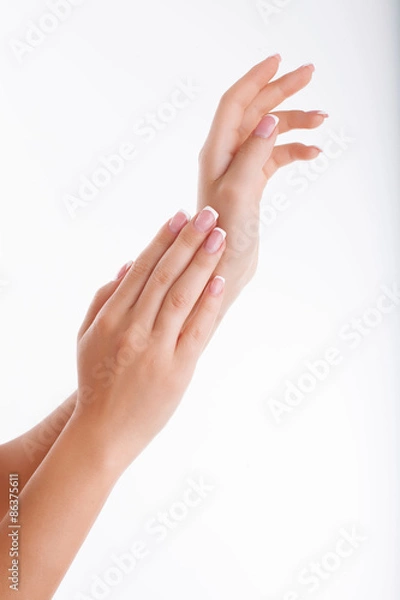 Fototapeta Beautiful human hands with cared manicured nails