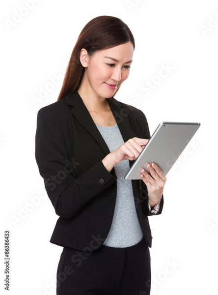 Obraz Businesswoman use of the digital tablet