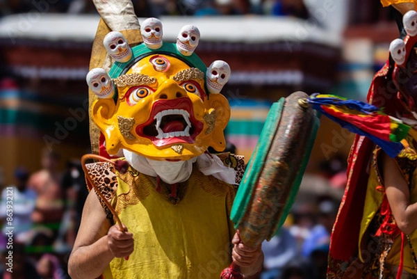 Fototapeta A colorful mask dance and drum beating being performed at Hemis Monastery at Leh, Ladakh India.