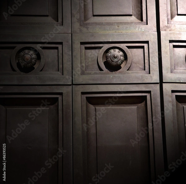 Fototapeta in london antique brown door  rusty  brass nail and light