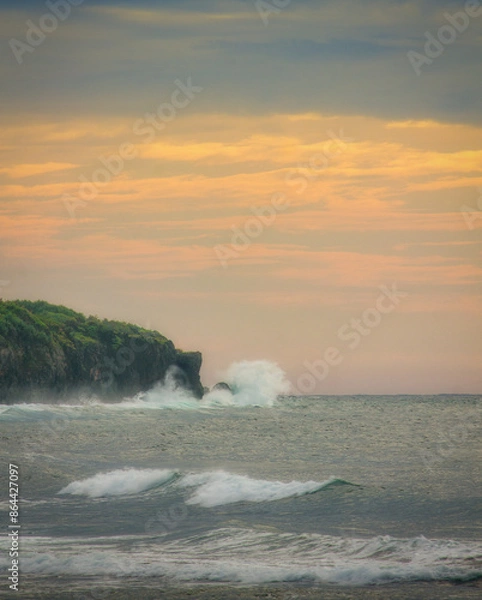 Fototapeta waves crashing on rocks