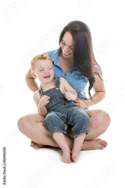 Obraz baby boy with his mother over a isolated white background