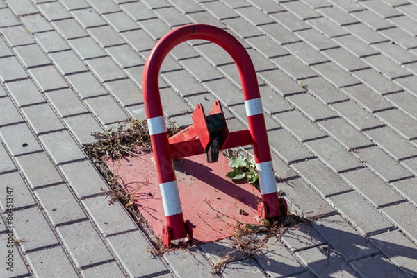 Obraz Roadblock mounted on a cobblestone street.