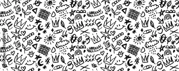 Fototapeta Vector seamless pattern  with charcoal graffiti doodle and girly shapes  Hand drawn abstract scribbles and squiggles, creative various shapes, pencil drawn. Scribbles, scrawls, stars, crown, grid.
