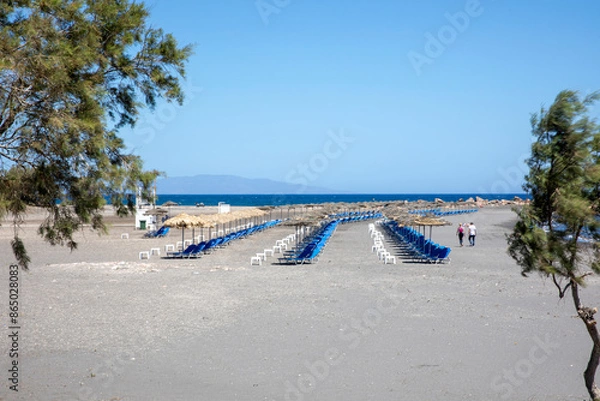 Obraz Santorini - Greece - May 17, 2024: Monolithos beach, Santorini, Cycladic Islands, Greece...