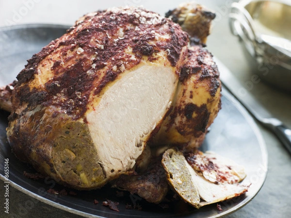 Fototapeta Roast Tandoori Chicken stuffed with Keema carved
