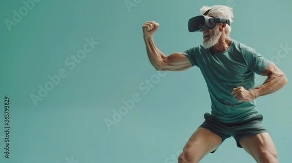 Obraz old man using VR headset