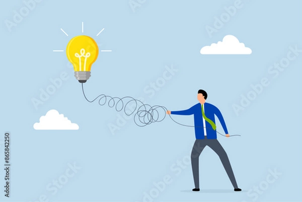 Fototapeta Simplify complex business idea, businessman unravels light bulb of amessy business idea.