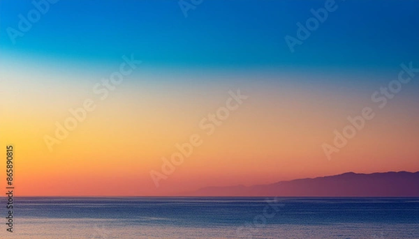 Fototapeta un hermoso paisaje del mar del oceano al atardecer al anochecer o amanecer con el horizonte al fondo con montañas y tranquilidad con paz en el mar con un cielo colorido con espacio para copiar