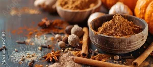 Fototapeta Essential spices for pumpkin spice include cinnamon, nutmeg, allspice, clove, and ginger with copy space image.