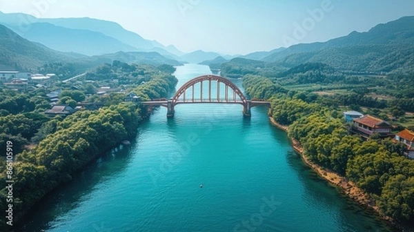 Obraz Drone perspective of the Kintai Bridge arching over the Nishiki River in Iwakuni