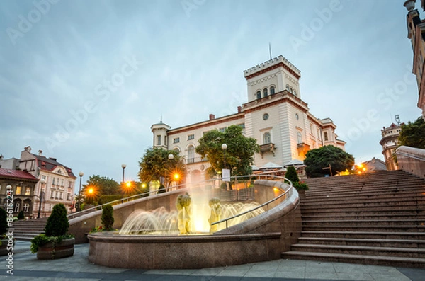 Fototapeta Main city square in Bielsko-Biala with fountain in front of Sulkowski castle 