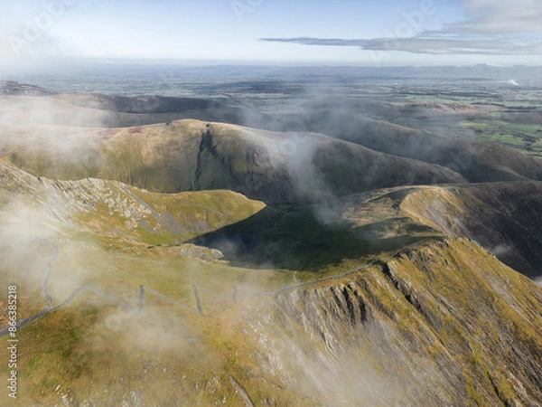 Fototapeta Amazing Cloud Inversion Over Mountain In The Lake Distract From Above