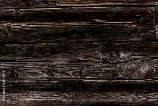 Fototapeta Dark rustic burnt wood background.