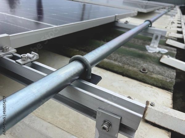 Fototapeta Install electrical conduits for the solar cell system on the roof.