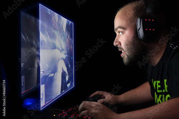 Obraz Gracz grał strzelankę z pierwszej osoby na High End PC.
