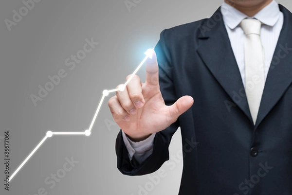 Fototapeta Businessman standing posture hand touch graph finance isolated on gray background