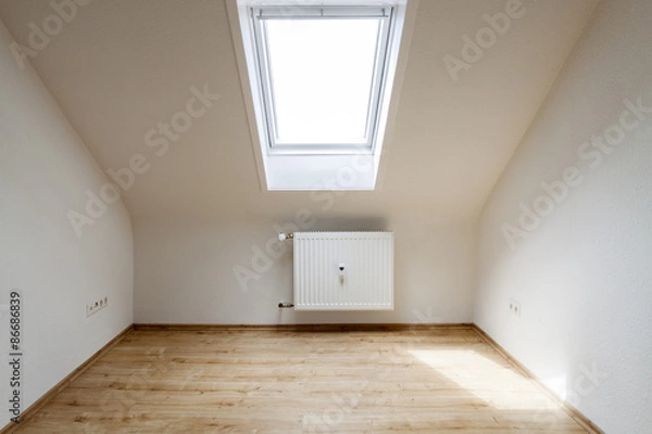 Obraz Empty attic room with roof skylight window