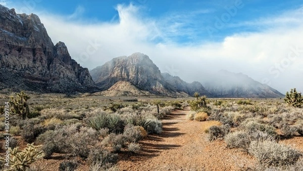 Fototapeta Red Rock Canyon Mountains covered with clouds