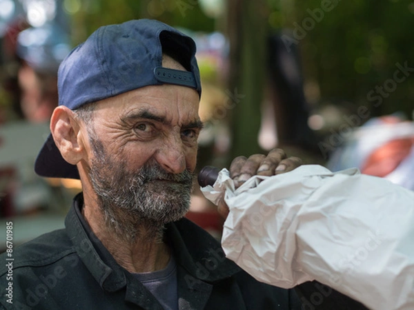 Obraz homeless man drinking