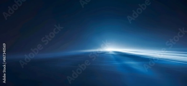 Fototapeta A beautiful blue background with smooth light beams.

