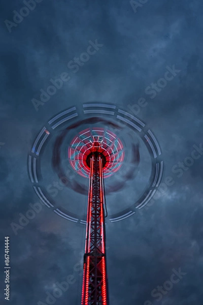 Fototapeta illuminated fast-moving carousel event