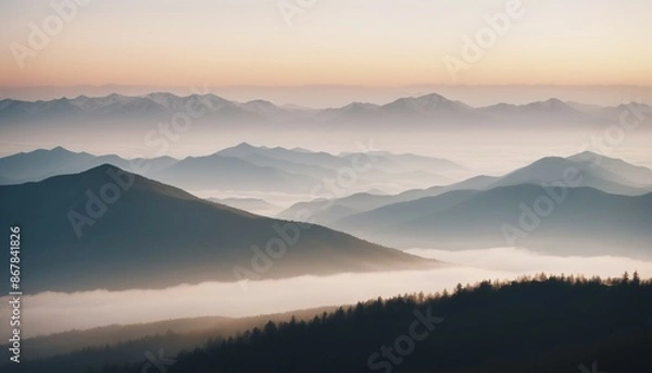 Fototapeta mountain layers and sunrise view in cold and foggy weather.
